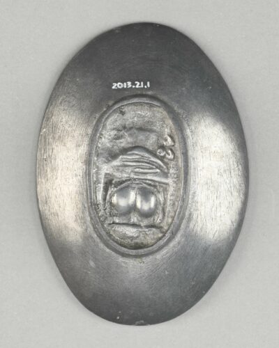 2013.21.1, Metal Ashtray. Reverse view.