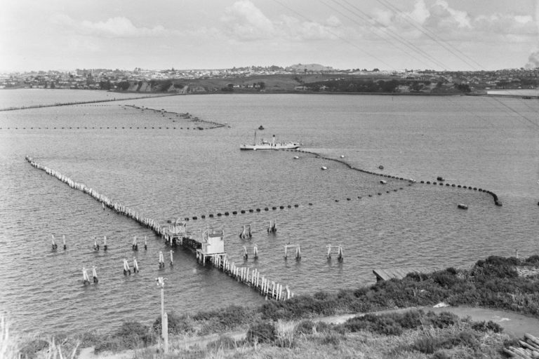 HMNZS Claymore (Z03) operating the net boom, 1943. It was used as a defence against enemy torpedoes.