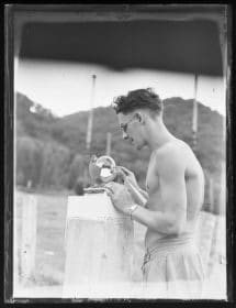 Sailor inspecting a sunshine recorder