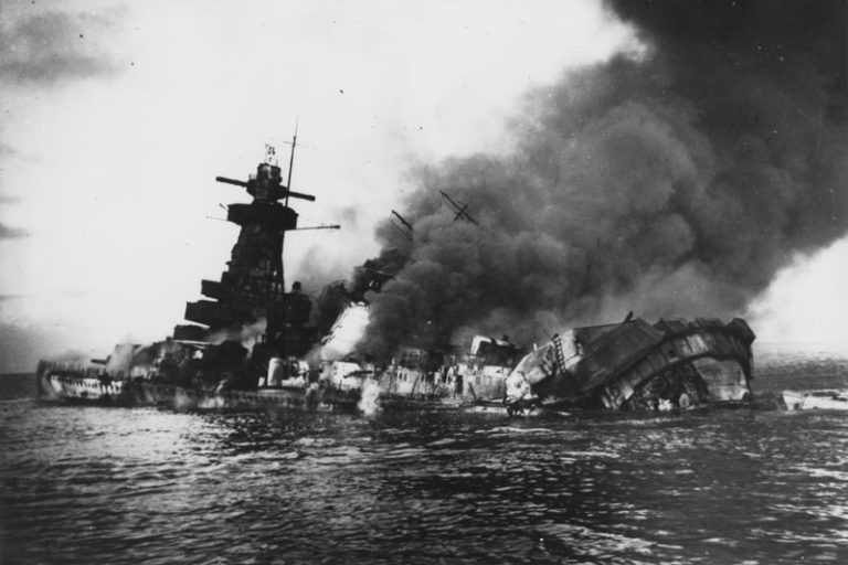 Smoke billows from Graf Spee as she sinks, 17 December 1939