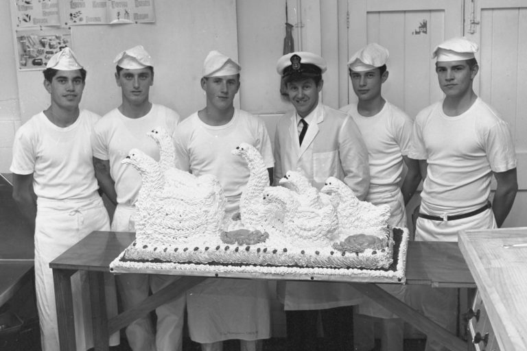 Image: PN 70 05374 01 Petty Officer Cook and trainees with swan cakes in July of 1970.