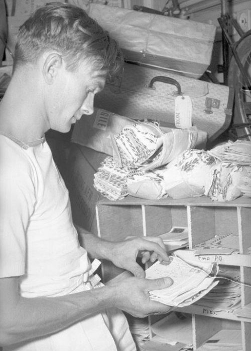 Sorting mail on board ship