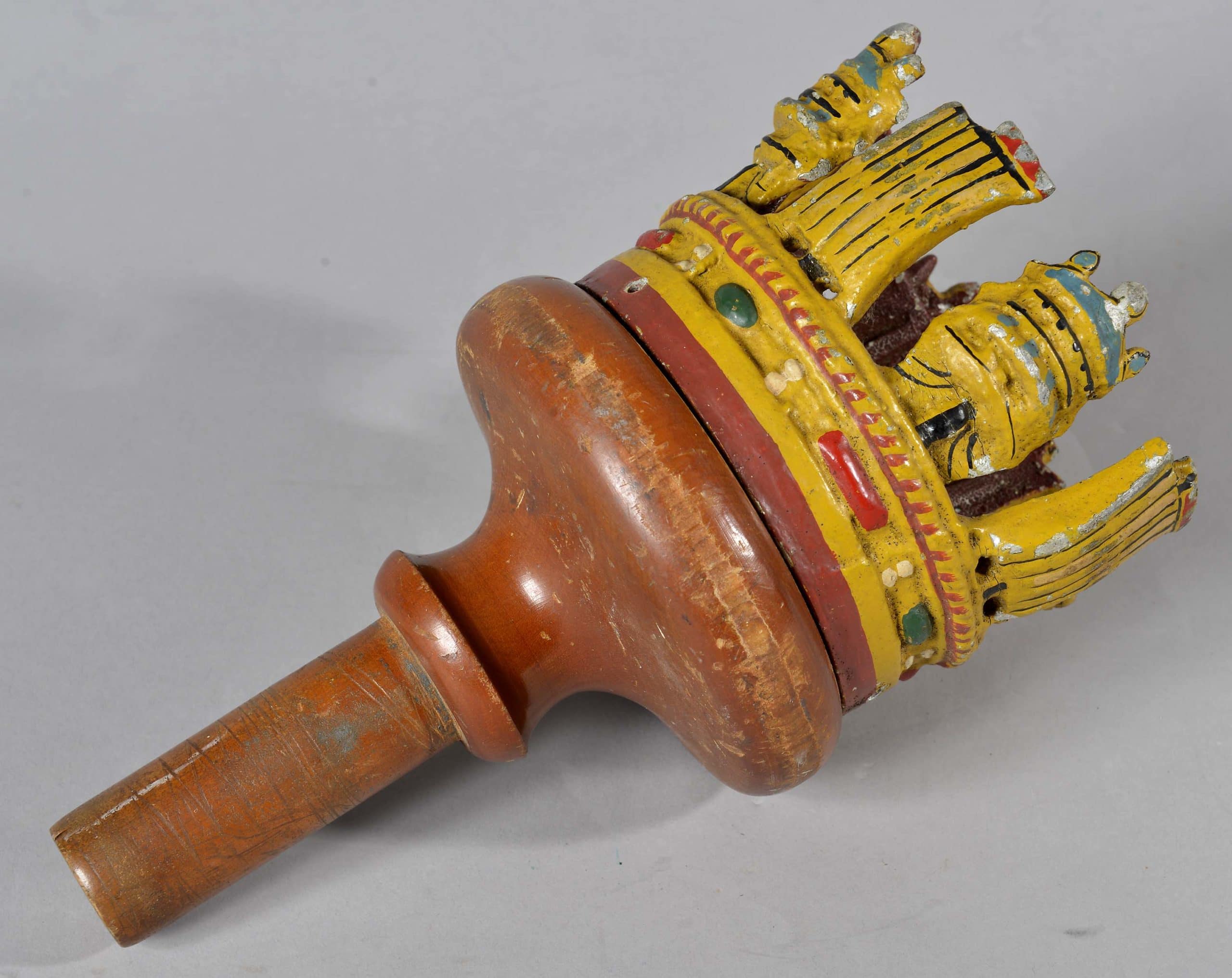 crown-21 Metal painted crown attached to short section of wooden masthead. Masthead crown is believed to have been from HMS New Zealand.